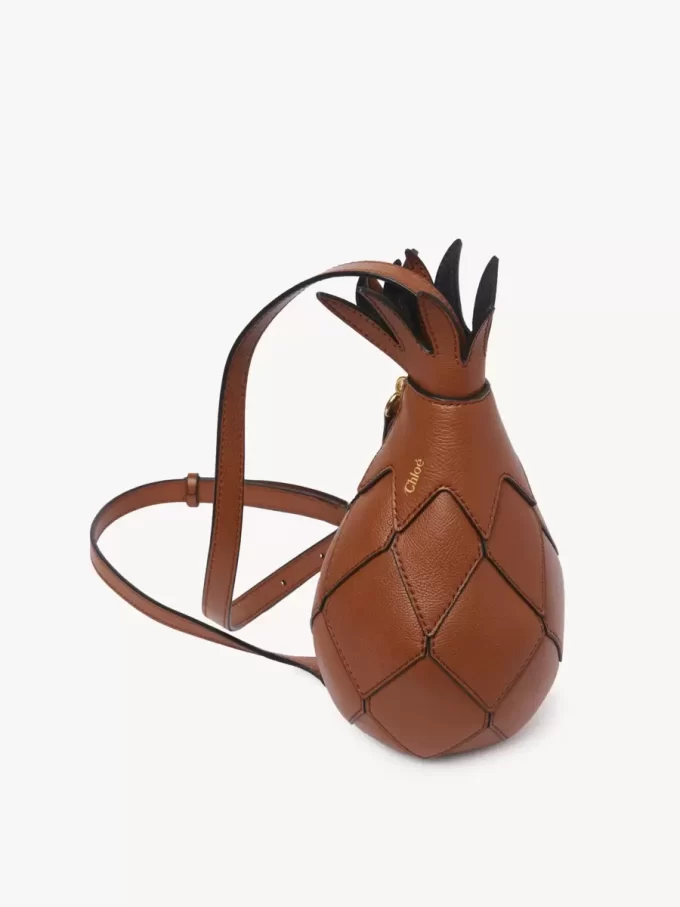 Ananas desenli deri omuz çantası Ananas desenli deri omuz çantası