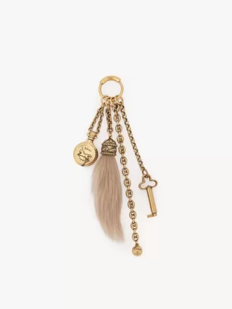 Chloé Symbols pirinç ve koyun postundan yapılmış çanta süsü Chloé Symbols pirinç ve koyun postundan yapılmış çanta süsü