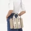 Keten ve deriden yapılmış küçük Woody tote çanta Keten ve deriden yapılmış küçük Woody tote çanta