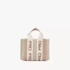 Keten ve deriden yapılmış mini Woody tote çanta Keten ve deriden yapılmış mini Woody tote çanta