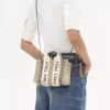 Keten ve deriden yapılmış mini Woody tote çanta Keten ve deriden yapılmış mini Woody tote çanta