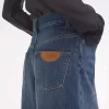 Kot pantolonlarda geniş paça Kot pantolonlarda geniş paça
