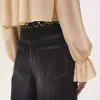 Kot pantolonlarda yüksek bel geniş paça Kot pantolonlarda yüksek bel geniş paça