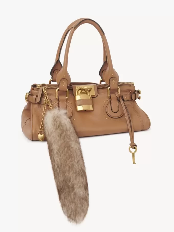 Koyun postundan yapılmış Treasure Tails tılsımı Koyun postundan yapılmış Treasure Tails tılsımı