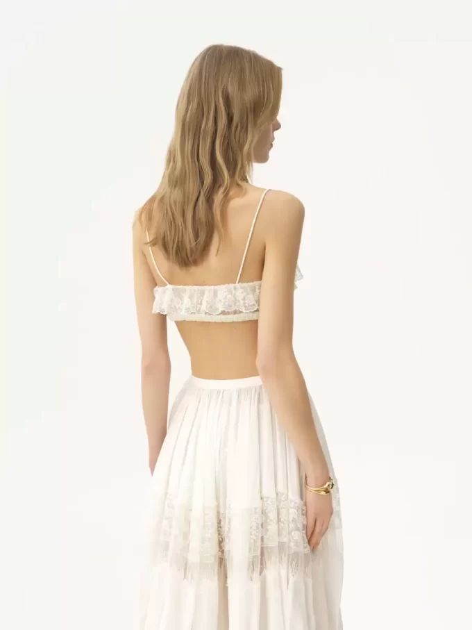 İşlemeli dantelden ince askılı fırfırlı bralet İşlemeli dantelden ince askılı fırfırlı bralet