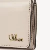 Mini Chloé Iconic parlak deri üç katlı çanta Mini Chloé Iconic parlak deri üç katlı çanta