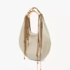 Parlak deriden yapılmış Twisted Shell hobo çanta Parlak deriden yapılmış Twisted Shell hobo çanta