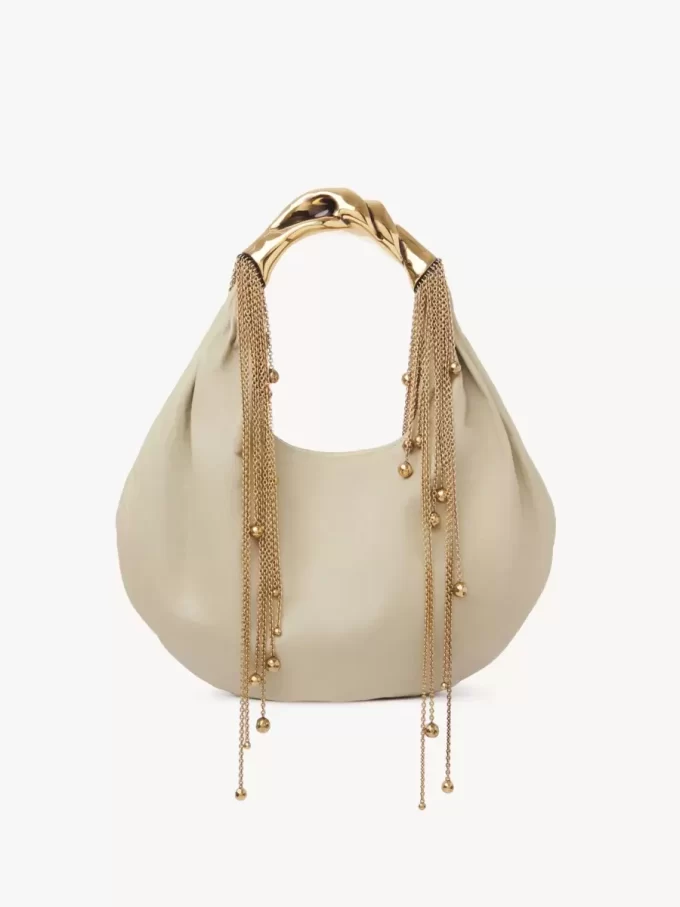 Parlak deriden yapılmış Twisted Shell hobo çanta Parlak deriden yapılmış Twisted Shell hobo çanta