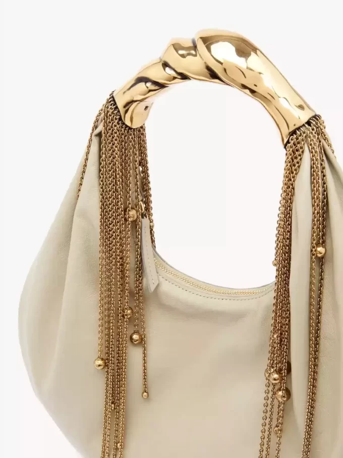 Parlak deriden yapılmış Twisted Shell hobo çanta Parlak deriden yapılmış Twisted Shell hobo çanta